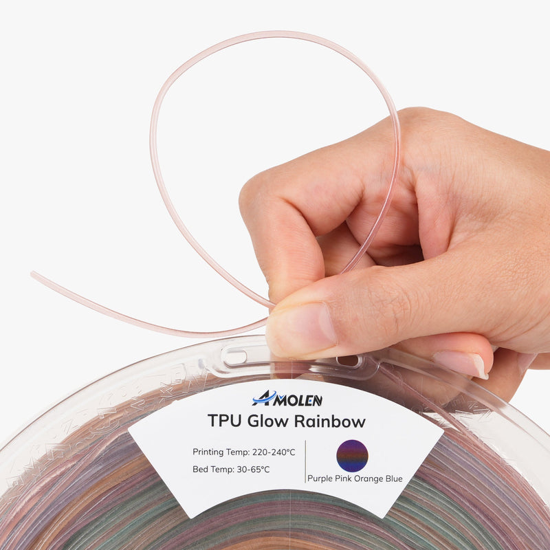 Amolen TPU glow-in-the-dark filament spool showing bright green filament on a reel for 3D printing.