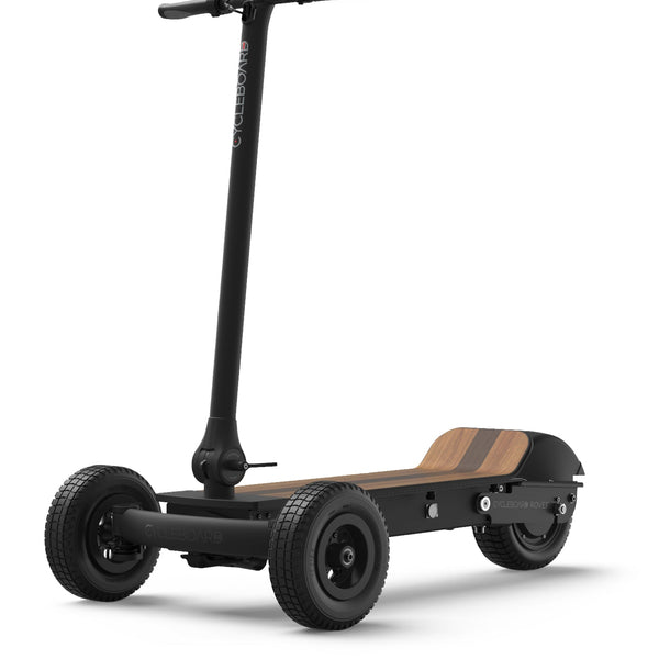 CycleBoard Rover board riding on pavement, showcasing its sleek design and durable construction for electric skateboard enthusiasts.