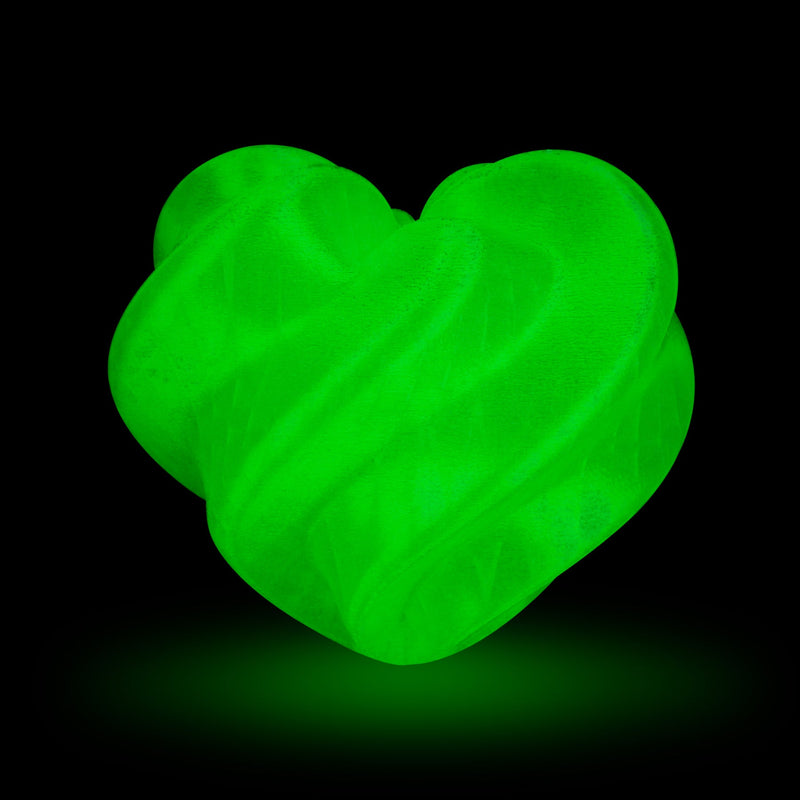 Amolen TPU glow-in-the-dark filament spool showing 1.75mm diameter filament for 3D printing, with packaging and label visible.