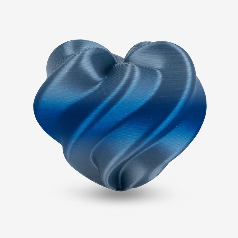 Shiny gradient PLA Silk filament by Amolen, 1.75mm, 1kg spool, showcasing vibrant color transitions and smooth texture.