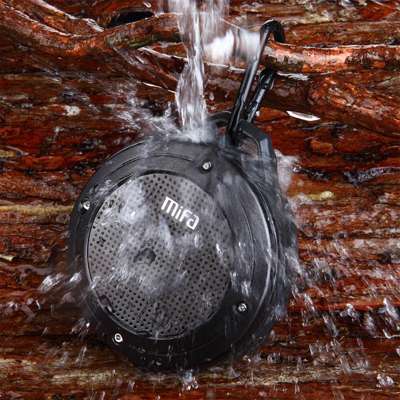 Outdoor wireless Bluetooth stereo portable speaker from Electronics Den with black rugged design and control buttons
