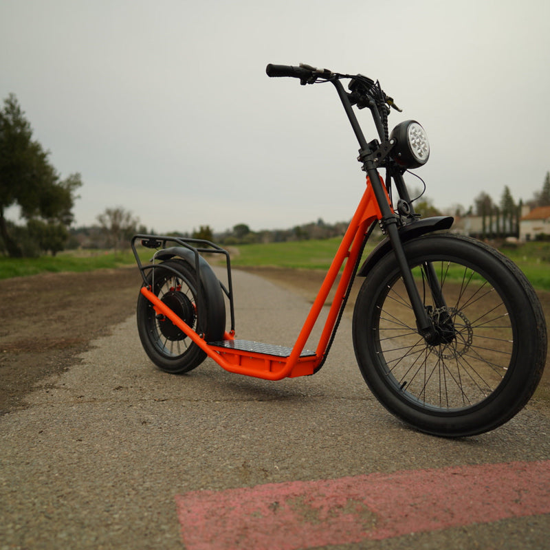 EUNORAU E-BIKE US JUMBO electric bicycle with sleek frame and 750W motor, shown outdoors on a paved path.