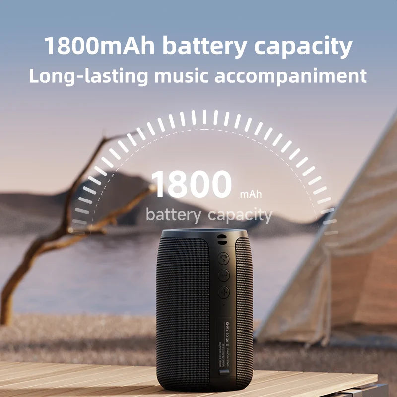 Mini wireless Bluetooth speaker by Electronics Den, compact portable design with buttons and speaker grille visible.