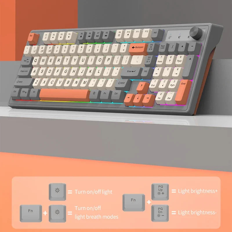 Wireless 98-key rainbow backlit keyboard from Electronics Den, showing colorful keys and sleek black design.