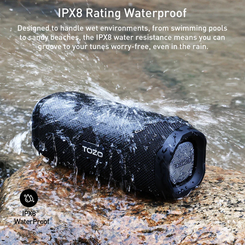Electronics Den Bluetooth speaker with dual drivers and dual bass diaphragms, compact design, black color, front view showing speaker grille