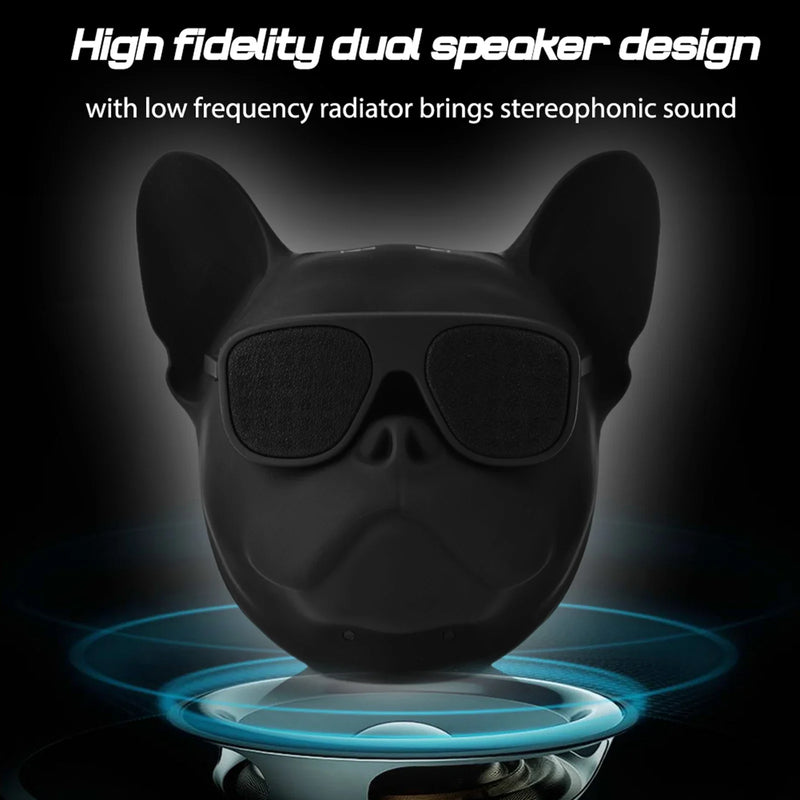 Dog-shaped portable Bluetooth speaker with stereo sound and subwoofer, compact design, ideal for music on the go.