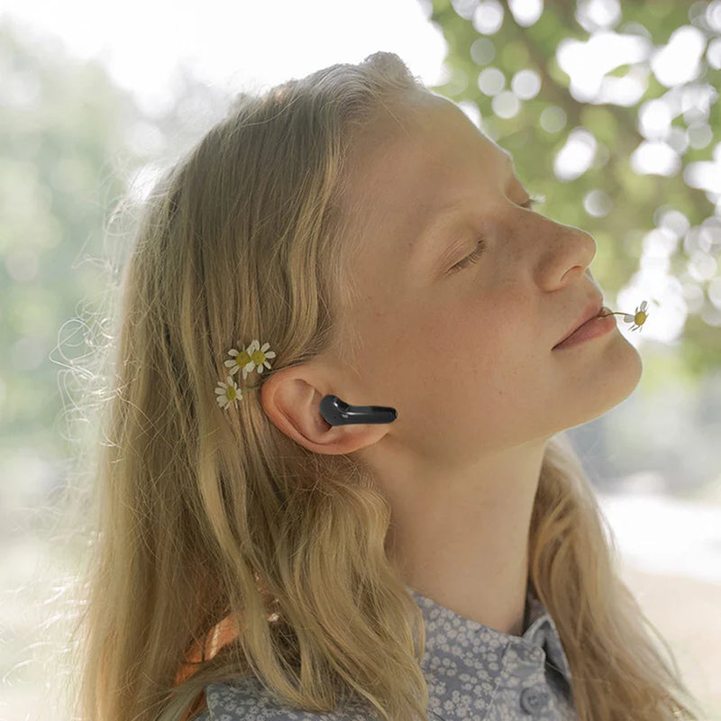 Wireless Bluetooth headset AIR31 by Electronics Den with in-ear design and charging case, shown in black.