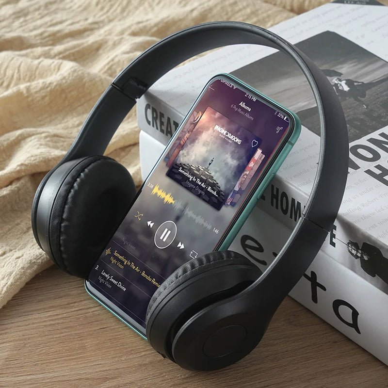 Wireless Bluetooth-compatible P47 headphones from Electronics Den, showing over-ear design and sleek black finish.