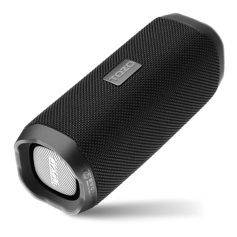 Electronics Den Bluetooth speaker with dual drivers and dual bass diaphragms, showcasing its compact design and textured surface.