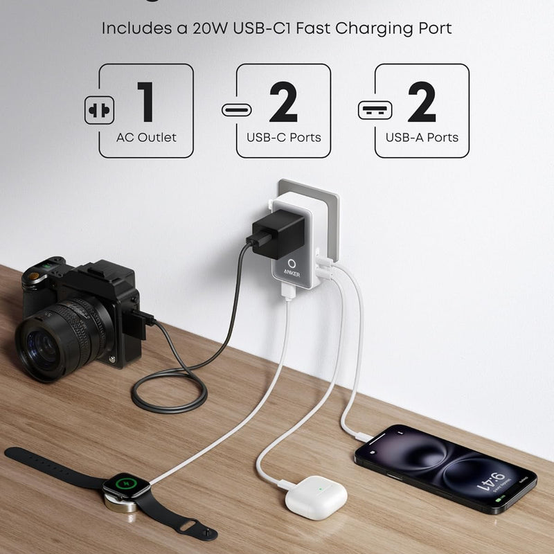 Anker Nano 5-in-1 travel adapter in white with multiple charging ports, compact design, and 20W power output for travel convenience.