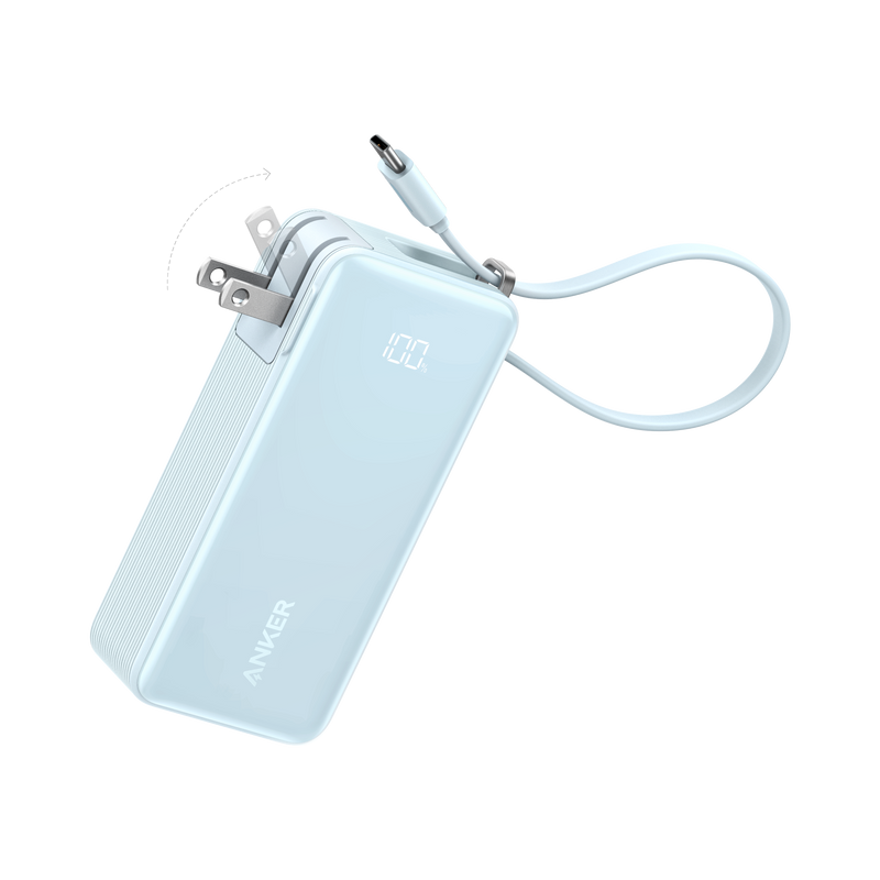 Anker Power Bank 10K with built-in USB-C cable in black, compact portable charger for smartphones and devices.