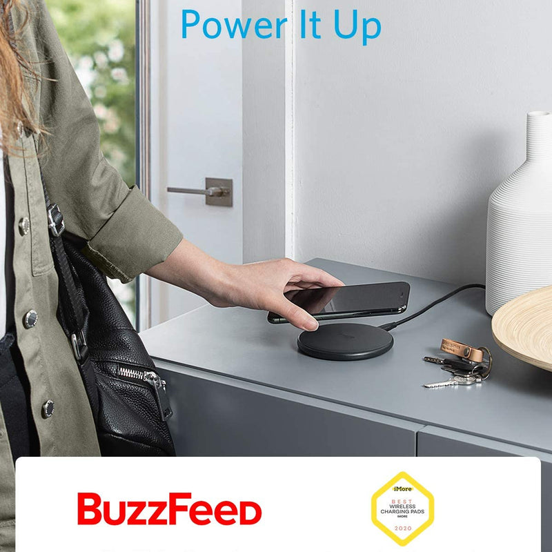 Anker 313 wireless charging pad in black, designed for fast charging smartphones on a sleek, compact pad.
