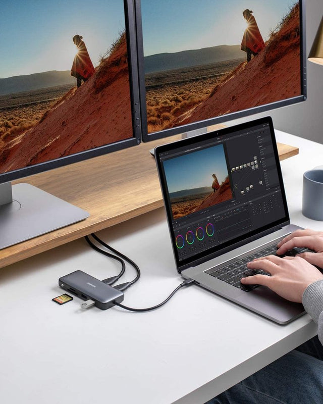 Anker 553 USB-C Hub in black showing multiple ports for charging and connectivity on a sleek device.