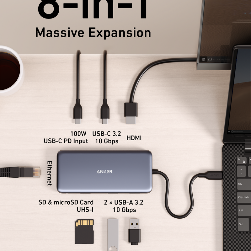 Anker 555 USB-C Hub in black showing multiple ports for charging, including USB-C, HDMI, and USB-A connectivity.