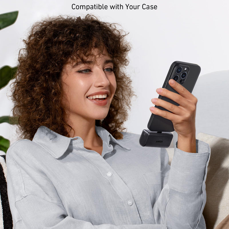 Anker Nano Power Bank in black with built-in USB-C connector, compact portable charger for quick charging.