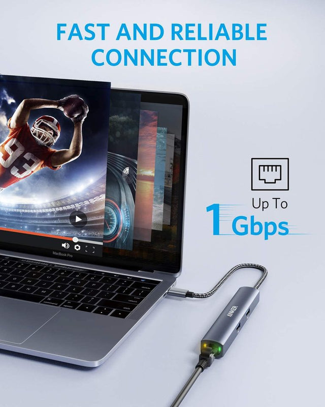 Anker 543 USB-C Hub in grey showing slim design with multiple charging ports and connectivity options for laptops and devices.