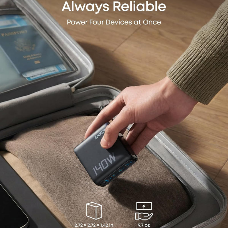 Anker 140W 4-port USB-C charger with PD 3.1 and included USB-C cable, dark gray, compact and versatile charging device.