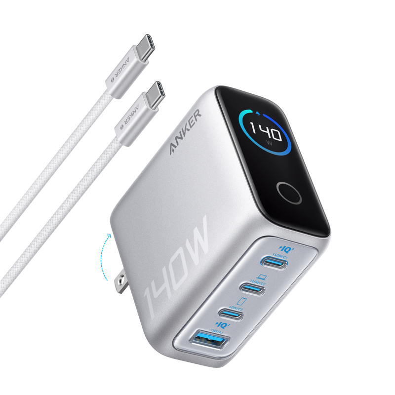 Anker 140W 4-port charger with USB-C PD 3.1 and included USB-C cable, dark gray color, compact and versatile charging device.