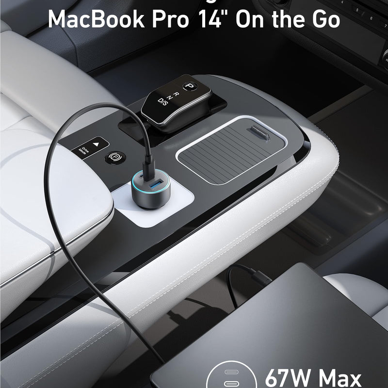 Anker 535 Car Charger 67W with dual USB ports, compact design, plugged into a car's cigarette lighter socket.
