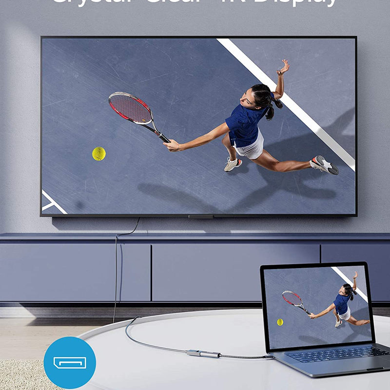 Anker PowerExpand USB-C to DisplayPort adapter connecting a laptop to a monitor for high-quality video output