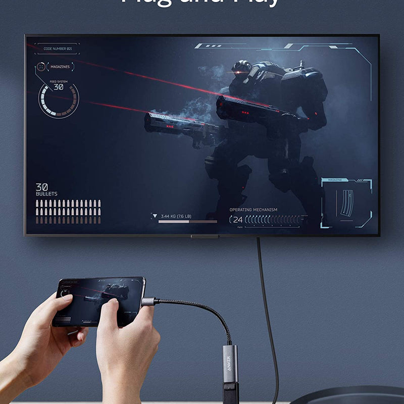 Anker PowerExpand USB-C to DisplayPort adapter connected to a laptop, showing the compact design and DisplayPort connection.