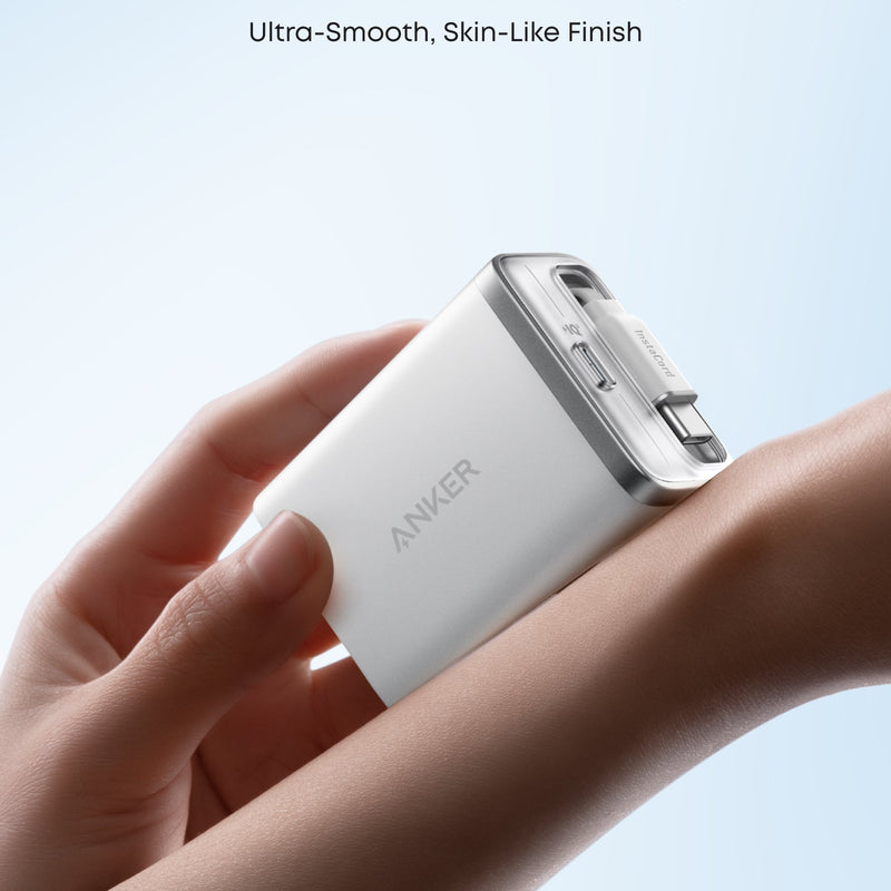 Anker Nano 35W charger with built-in retractable USB-C cable, compact white power adapter for fast charging devices.