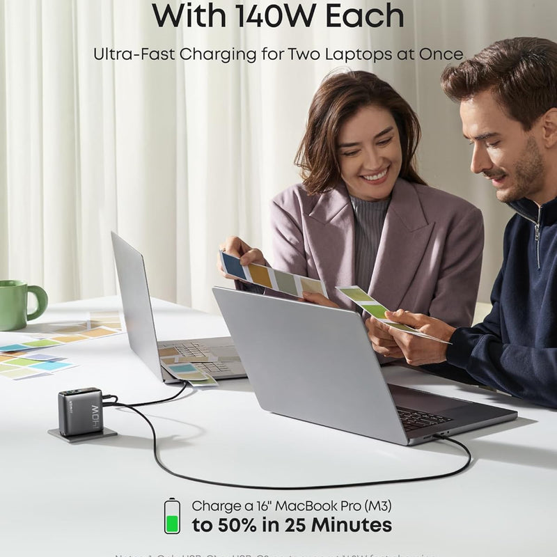 Anker 25K 165W laptop power bank in space black with built-in and retractable cables, portable and high-capacity charging device.