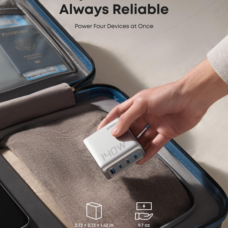 Anker 25K 165W laptop power bank in space black with built-in and retractable cables for portable charging.