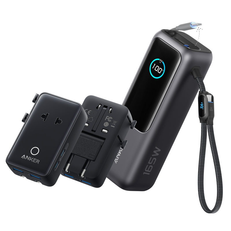 Anker 25K 165W laptop power bank in space black with built-in, retractable cables for portable charging.