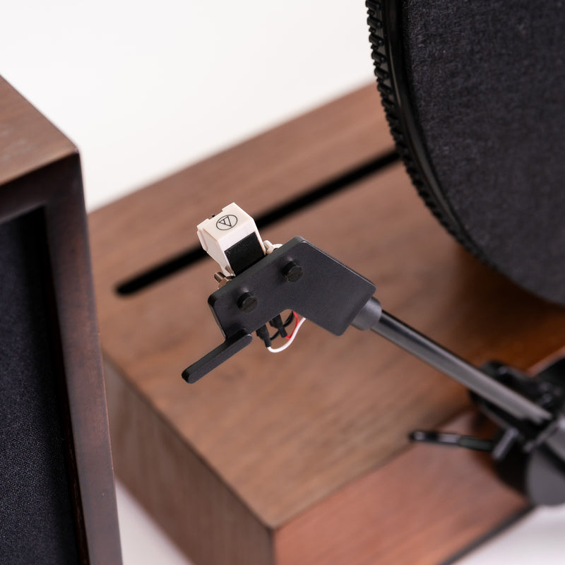 Fuse Audio GLD vertical vinyl record player, turntable with gold finish, showcasing a modern design for vinyl music enthusiasts.