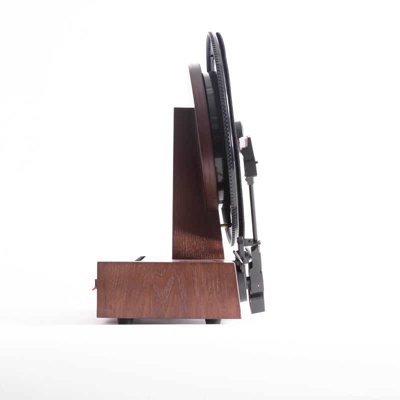 Fuse Audio GLD vertical vinyl record player, turntable with gold finish, showcasing modern design and record spinning in a stylish setup.